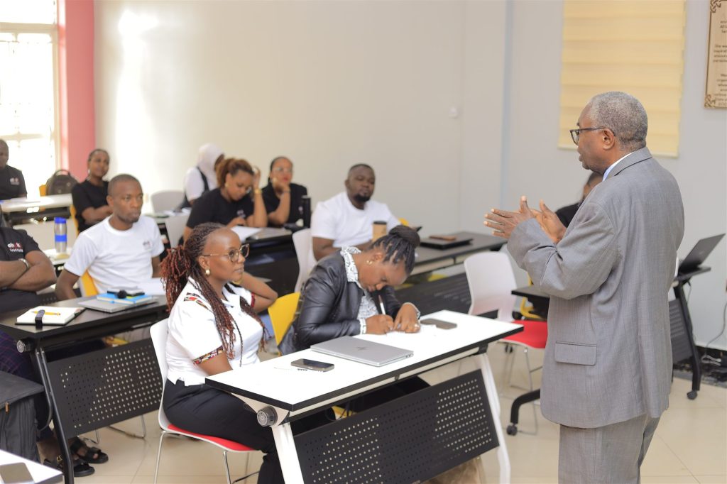 AIHS senior faculty member addressing students
