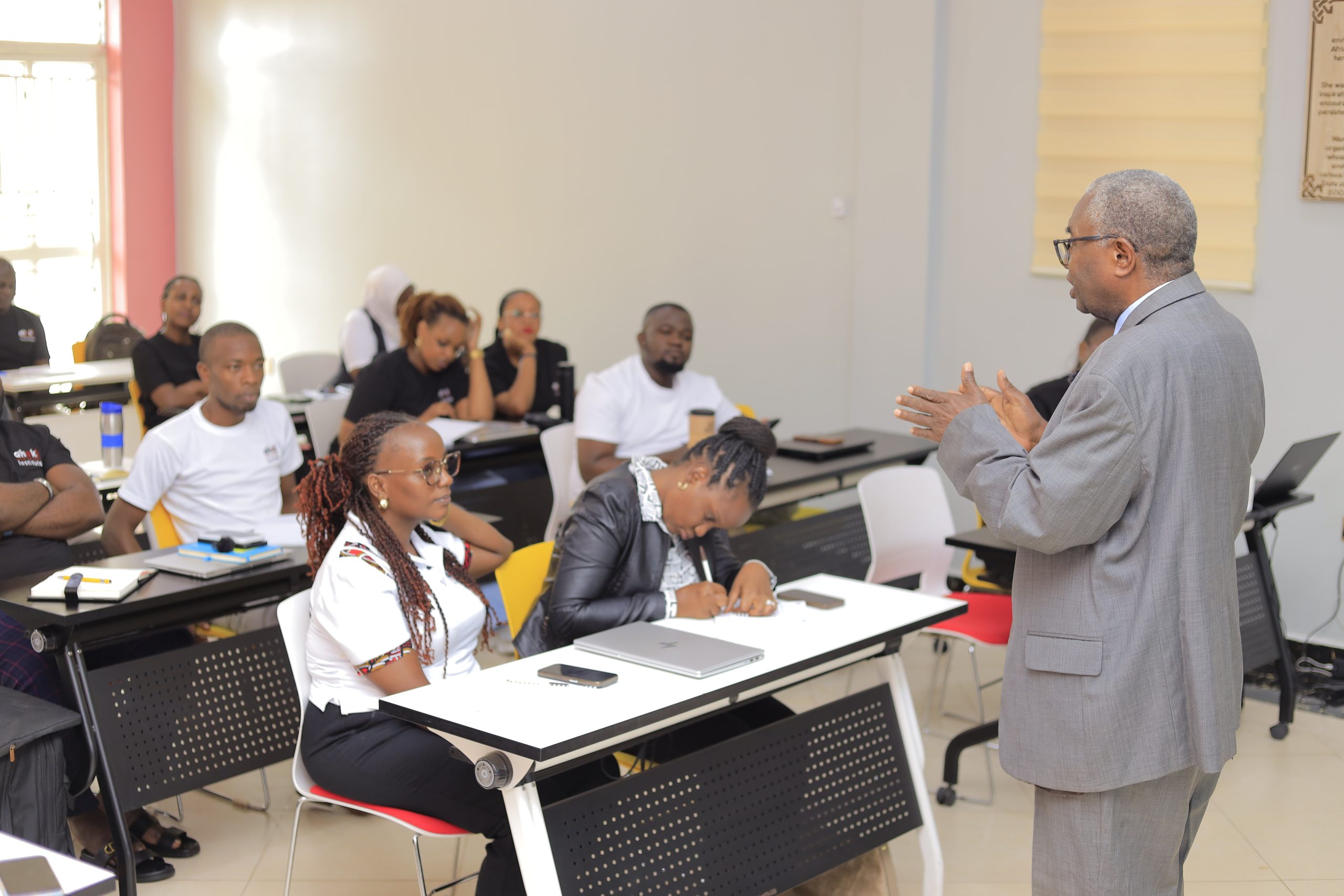 AIHS senior faculty member addressing students